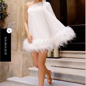Chic One-Shoulder White Dress with Feather Detail